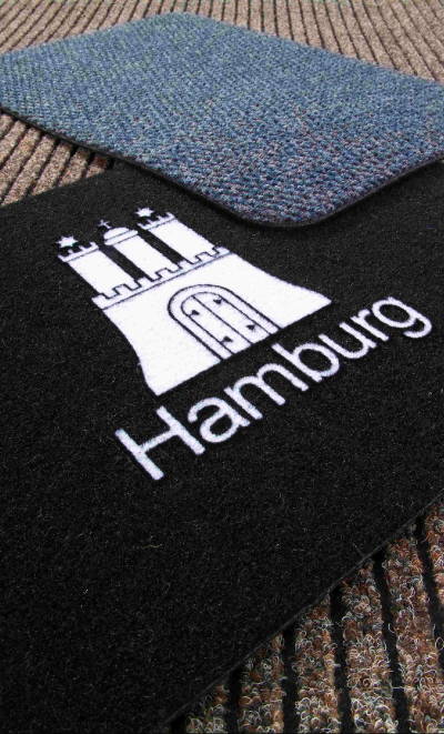 Trebo zwingt den Schmutz auf die Matte